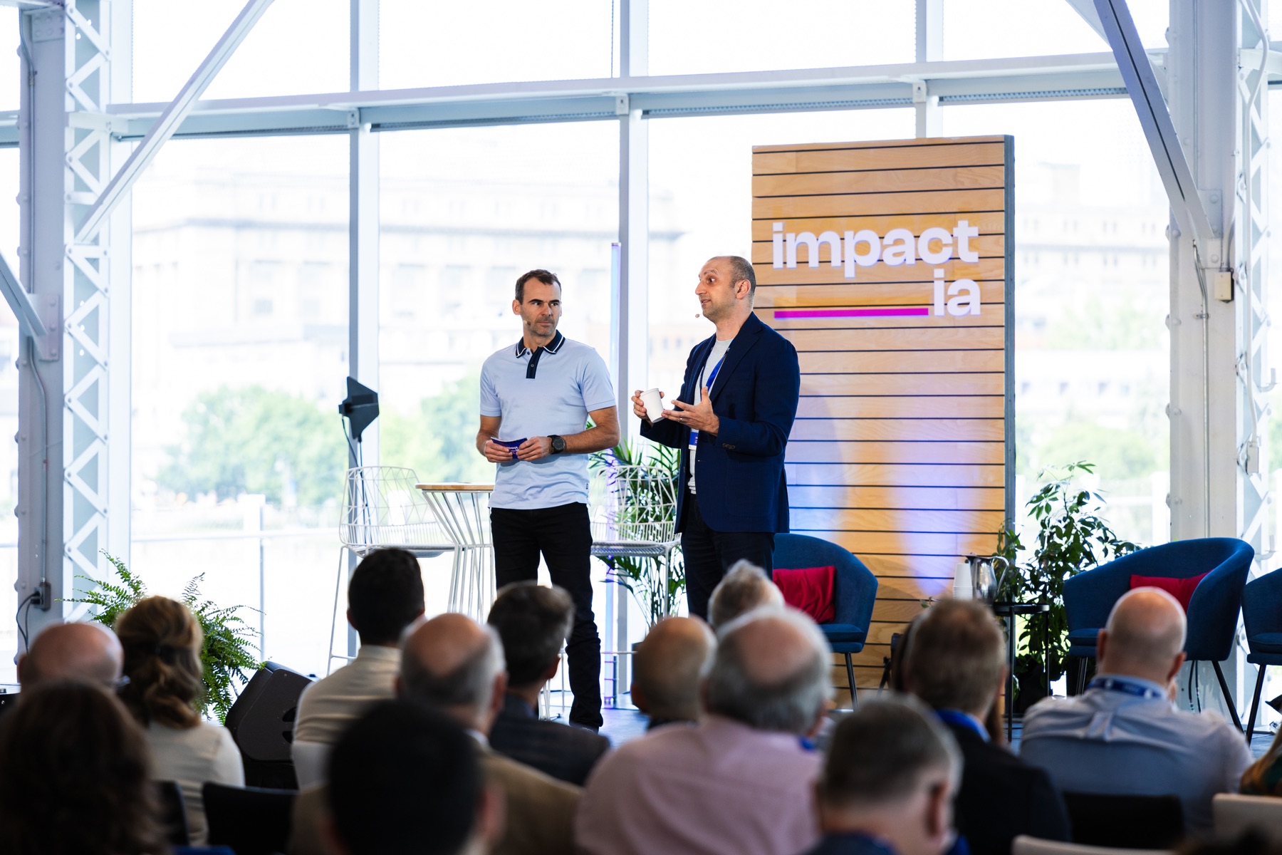 Jean Fahmy explaining a technology and AI framework to an audience