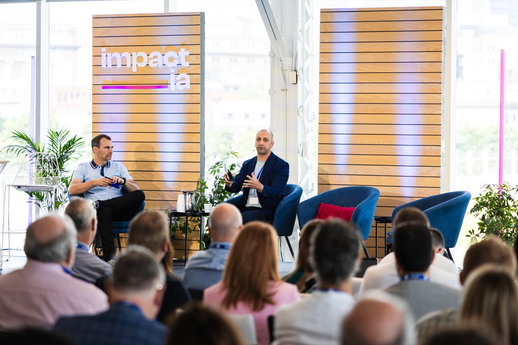 Jean Fahmy engaging an audience during an industry event